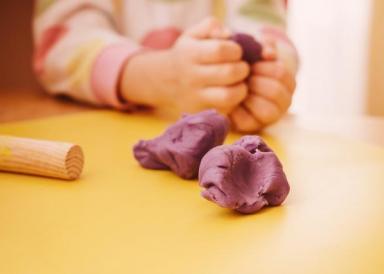 A child using molding clay