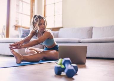 A lady doing an online workout
