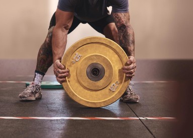 an athlete lifting weight 