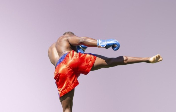 A man doing kickboxing